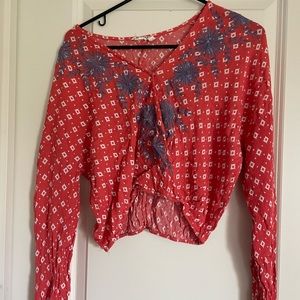TJ Maxx Red/Orange Cropped Long Sleeve Blouse with Blue Design at Top